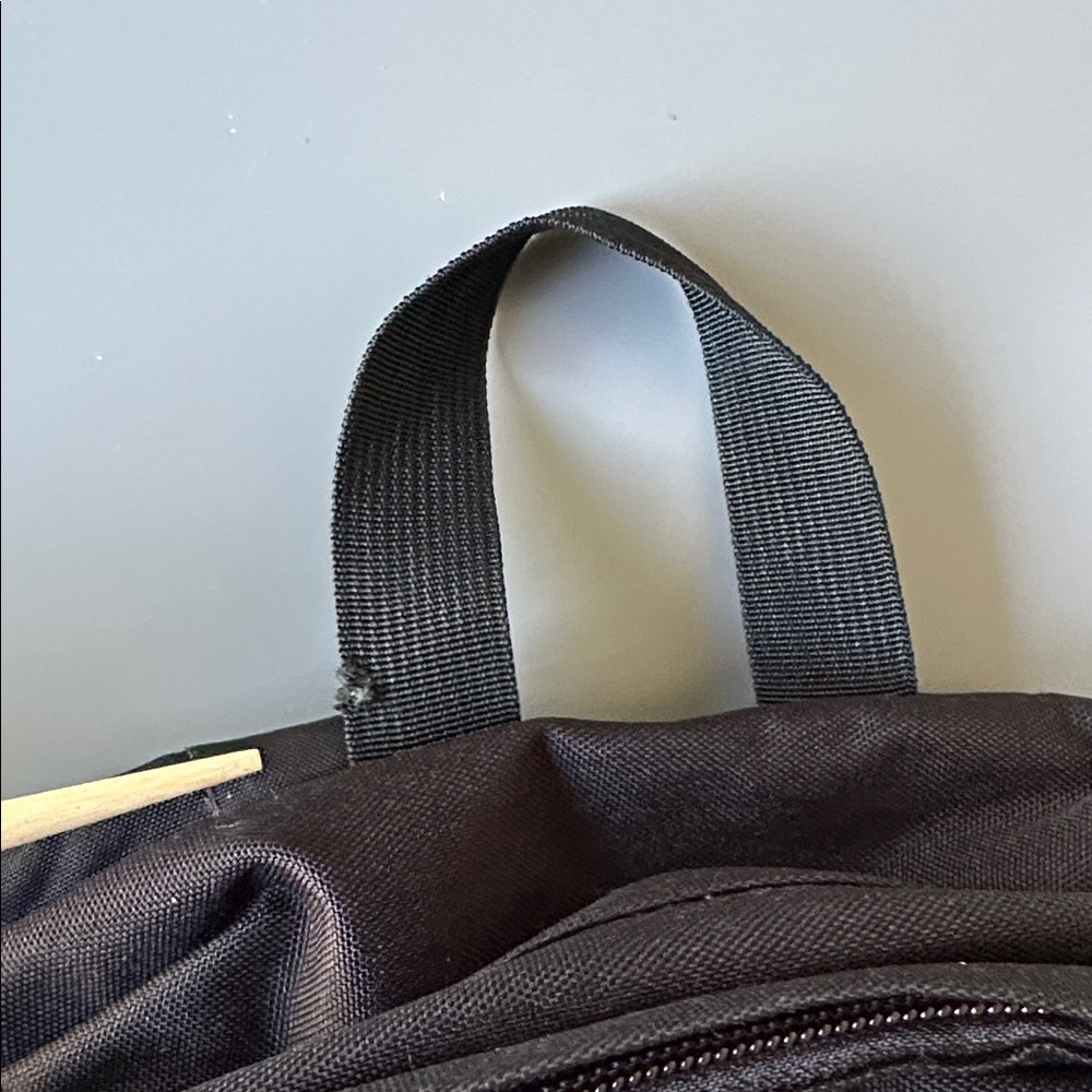Jansport Black Backpack with Navy Logo Patch - Picture 7 of 15